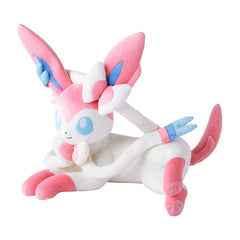 Plush toy of a character with pink and white color scheme on a white background