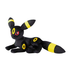 Black and yellow plush toy on a white background