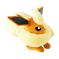 Plush toy of a cartoon character with yellow and white colors on a white background