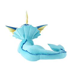 Blue dragon-like plush toy on a white background